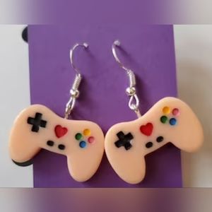 Peach colored game controllers earrings